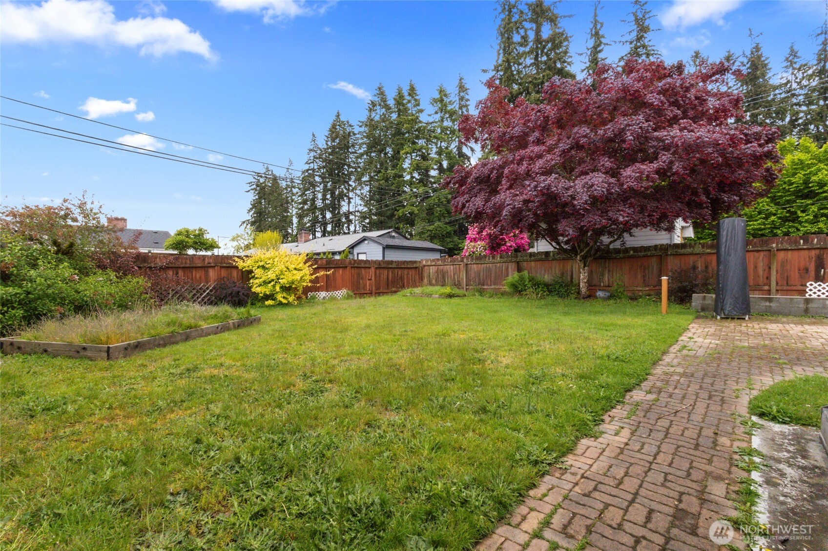 5117 Delaware Avenue Everett, WA 98203 - Photo 23 of 36 a view of a house with a yard