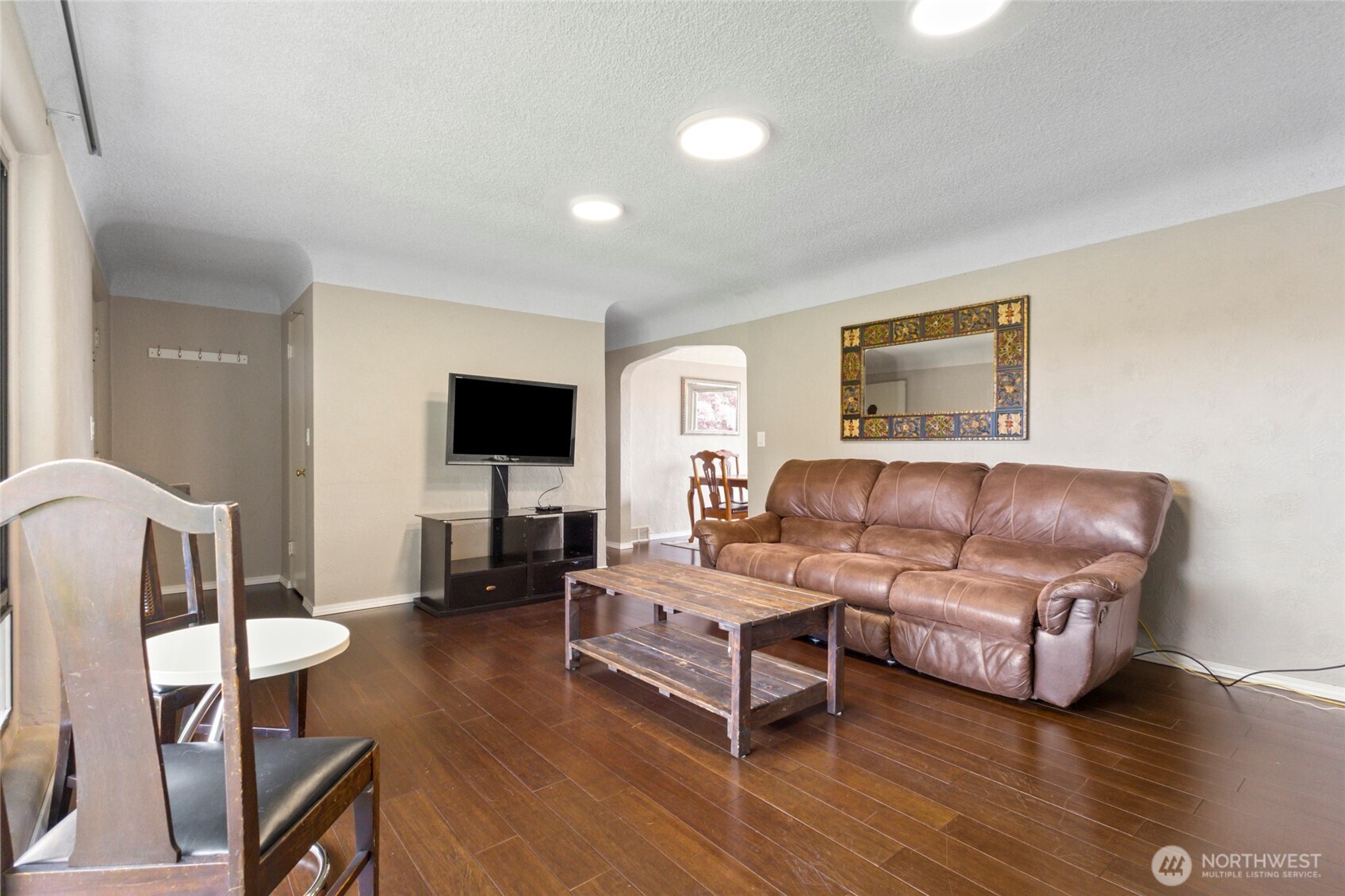 5117 Delaware Avenue Everett, WA 98203 - Photo 6 of 36 a living room with furniture and a flat screen tv