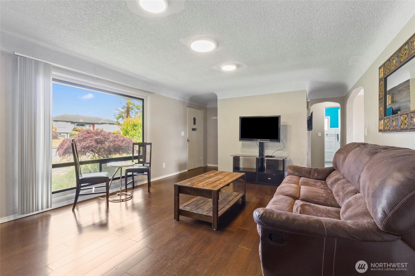 5117 Delaware Avenue Everett, WA 98203 - Photo 7 of 36 a living room with furniture and a flat screen tv
