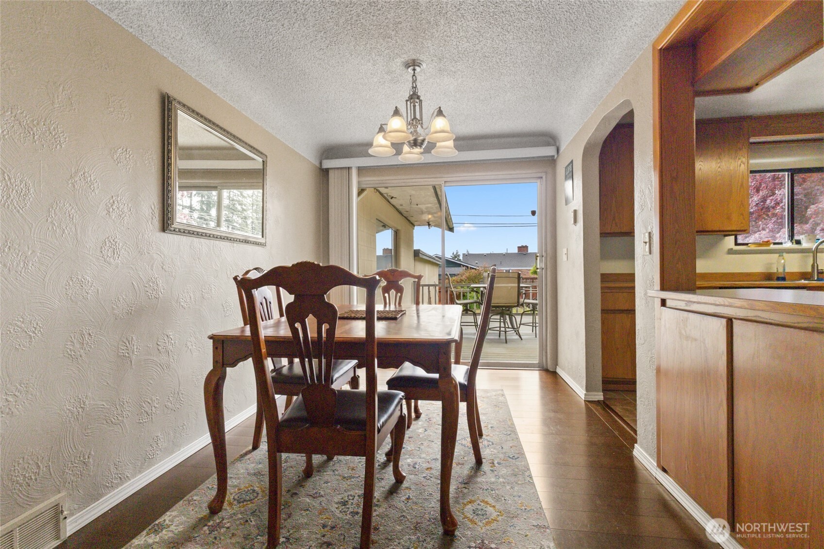 5117 Delaware Avenue Everett, WA 98203 - Photo 8 of 36 a view of a dining room with furniture window and wooden floor