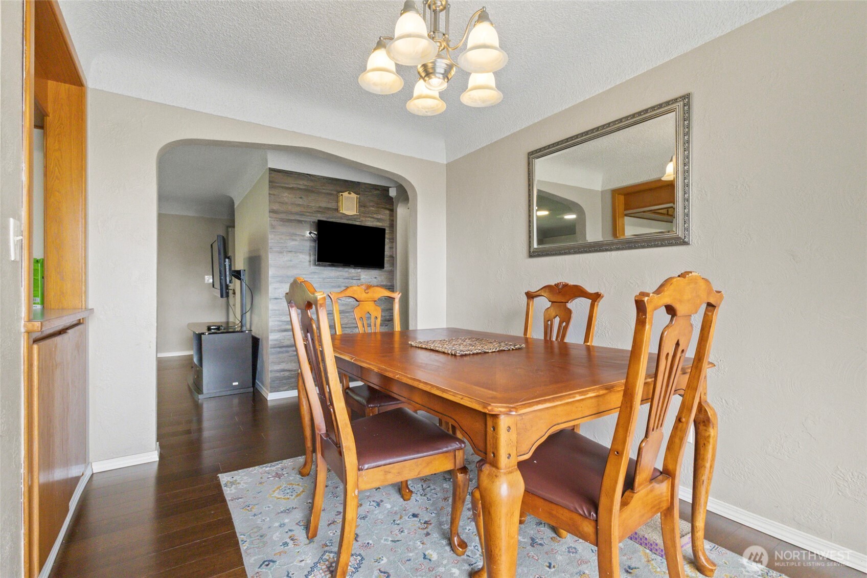 5117 Delaware Avenue Everett, WA 98203 - Photo 9 of 36 a view of a dining room with furniture and wooden floor
