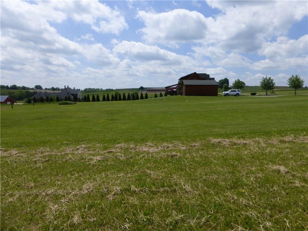 242 Reibold Road Renfrew, PA 16053 - Photo 11 of 14 a view of a green field with house in the background