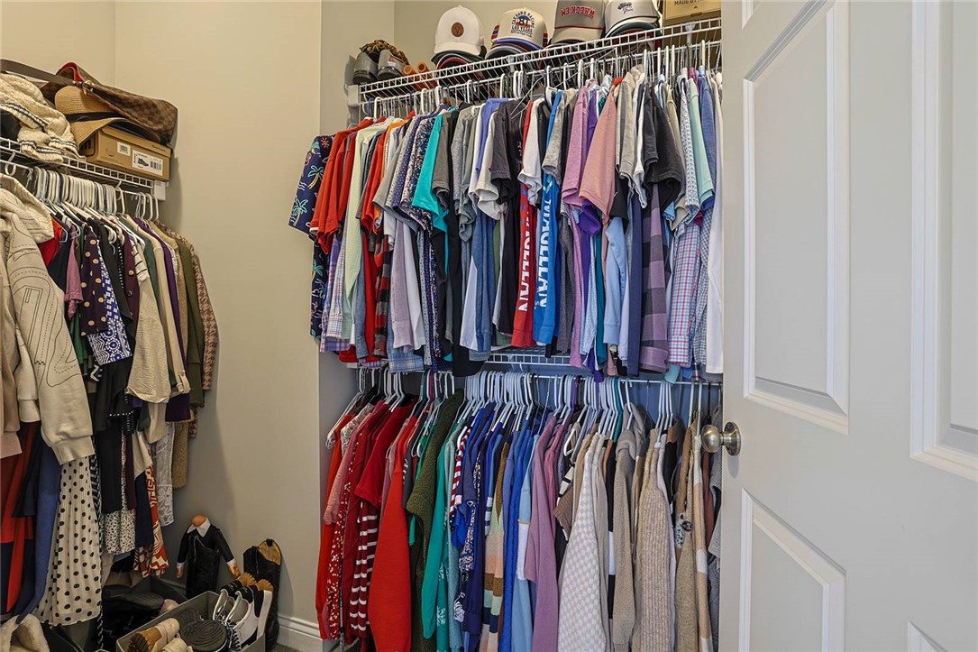 5013 Arena Court Hamilton, OH 45011 - Photo 21 of 41 This spacious walk-in closet offers ample storage and organization for your wardrobe.