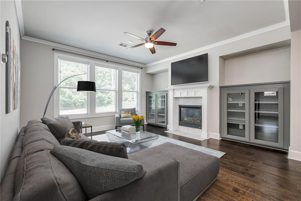 2088 Oak Knob Drive Decatur, GA 30032 - Photo 1 of 1 a living room with fireplace furniture and a flat screen tv