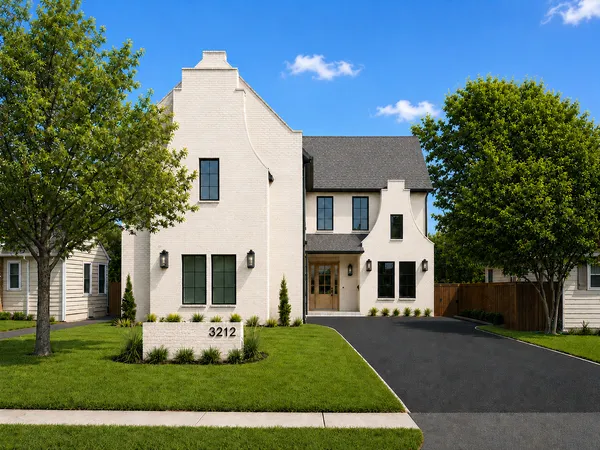 front view of a house with a yard