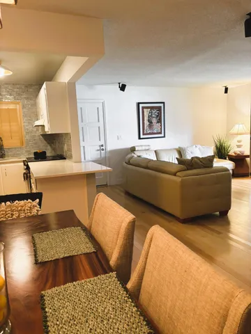 a living room with furniture and a couch