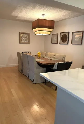 a dinning room with table and couch