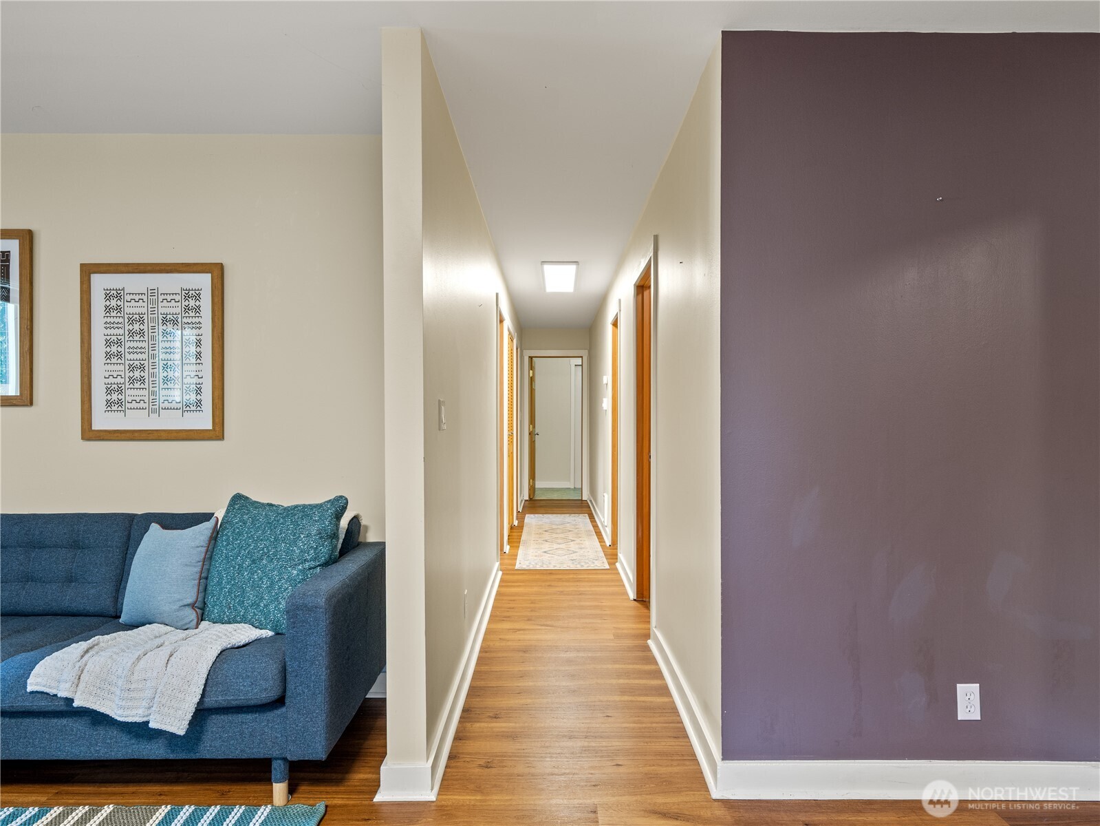 465 Winslow Way East, Unit 108 Bainbridge Island, WA 98110 - Photo 15 of 38 a view of livingroom with furniture and wooden floor