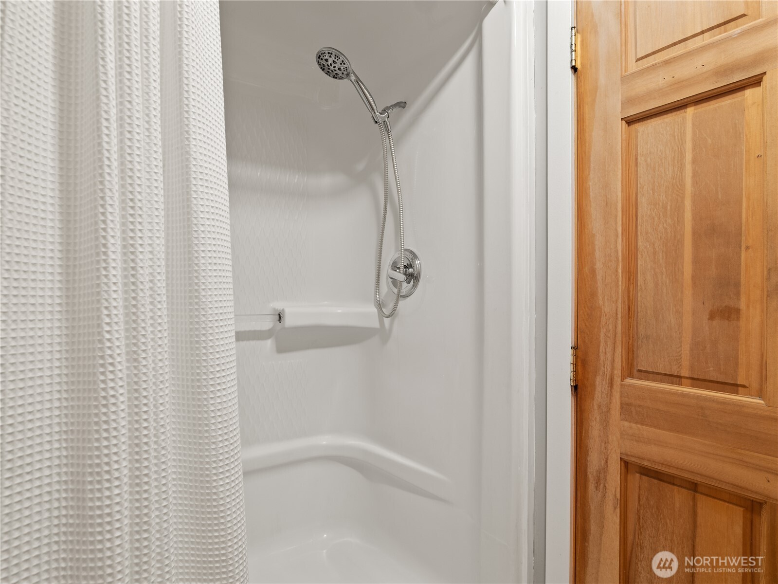 465 Winslow Way East, Unit 108 Bainbridge Island, WA 98110 - Photo 26 of 38 a bathroom with a shower