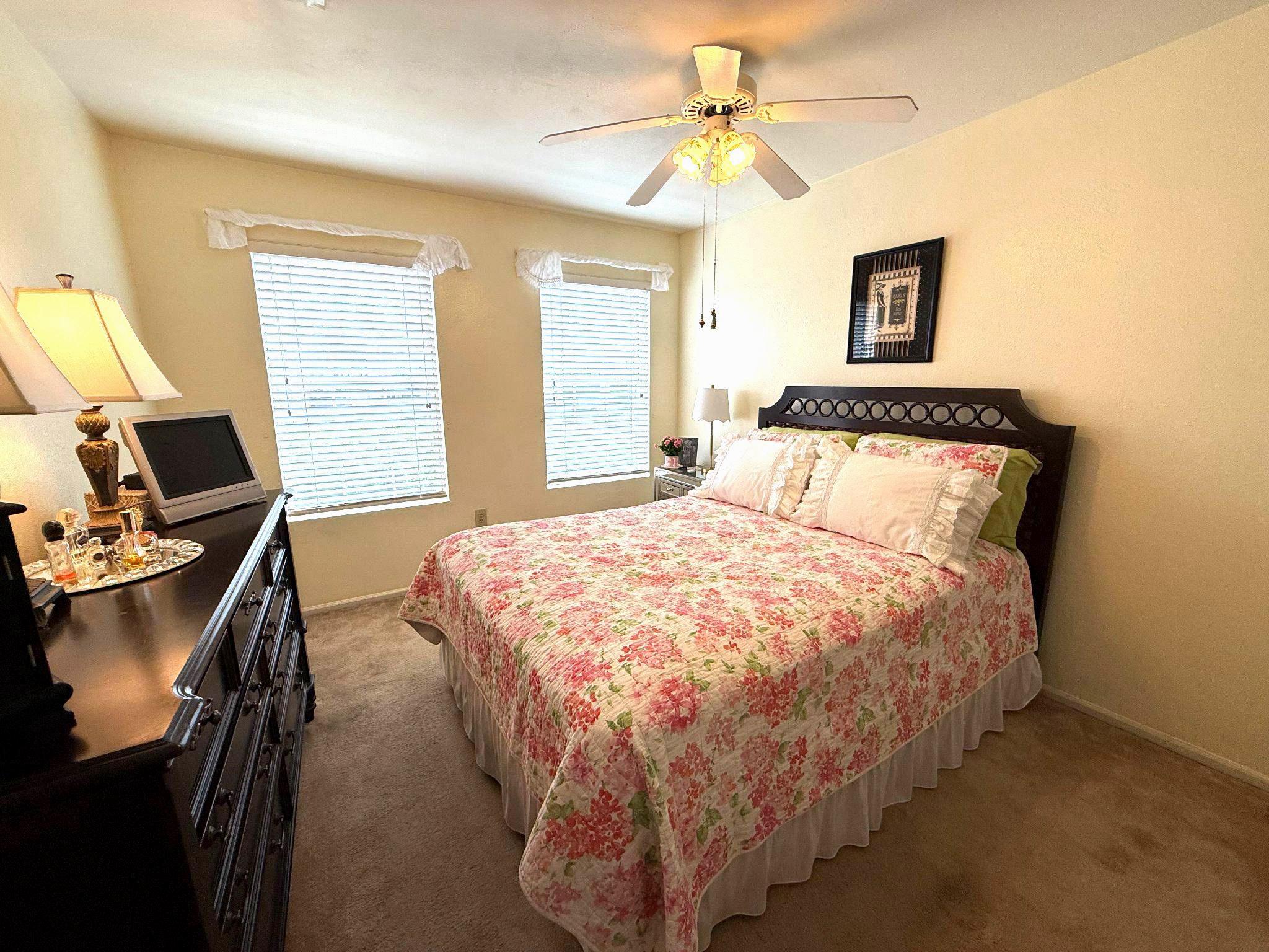 302 Canterbury Road, Unit 302E Bel Air, MD 21014 - Photo 16 of 39 a bedroom with a bed and a flat screen tv