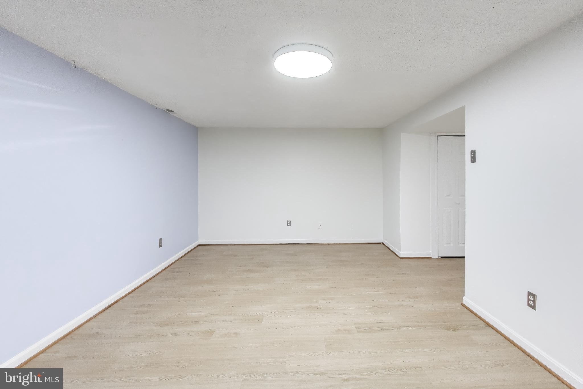 20210 Maple Leaf Court Gaithersburg, MD 20886 - Photo 16 of 31 a view of an empty room