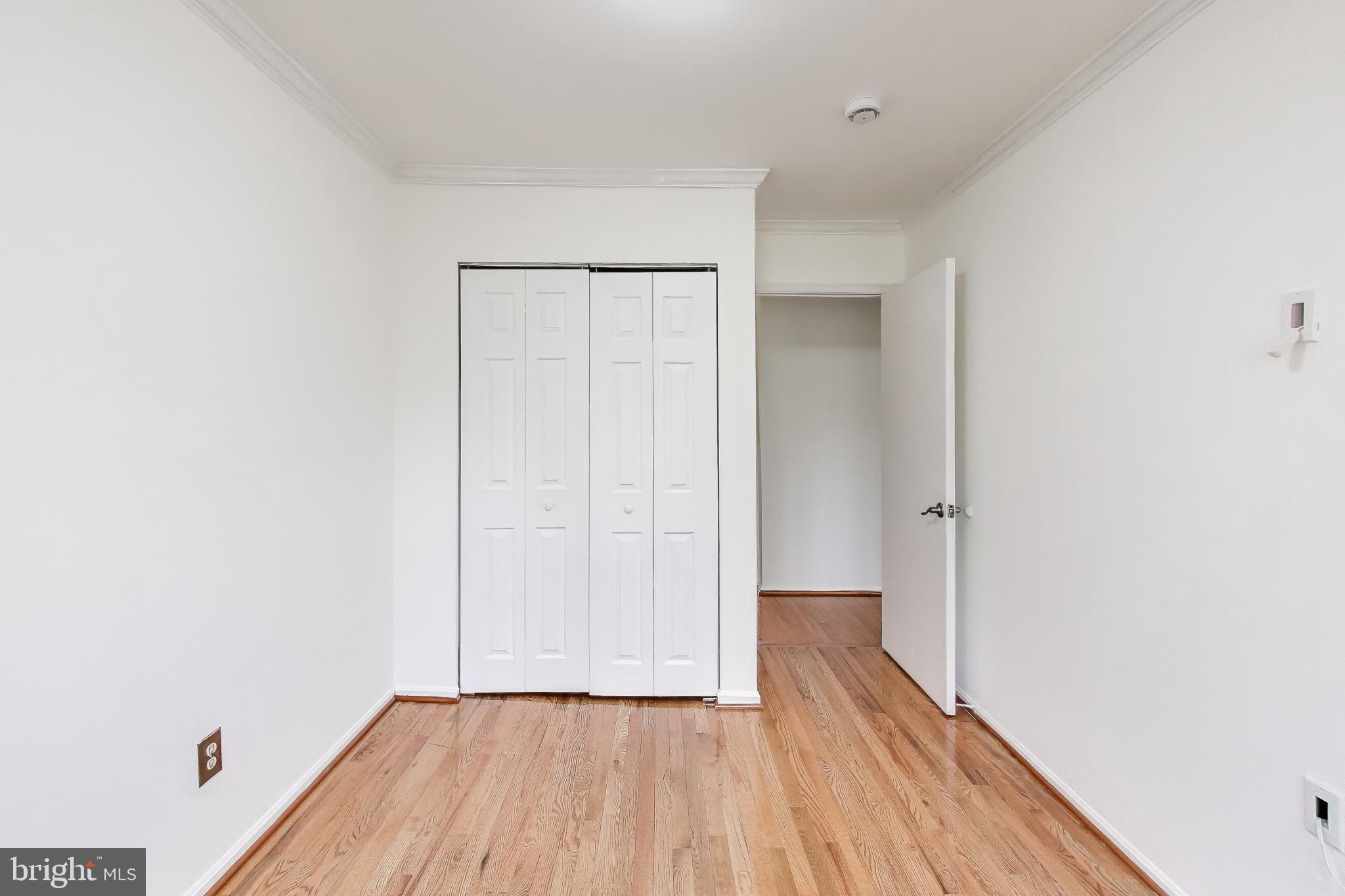 20210 Maple Leaf Court Gaithersburg, MD 20886 - Photo 19 of 31 a view of a room with wooden floor