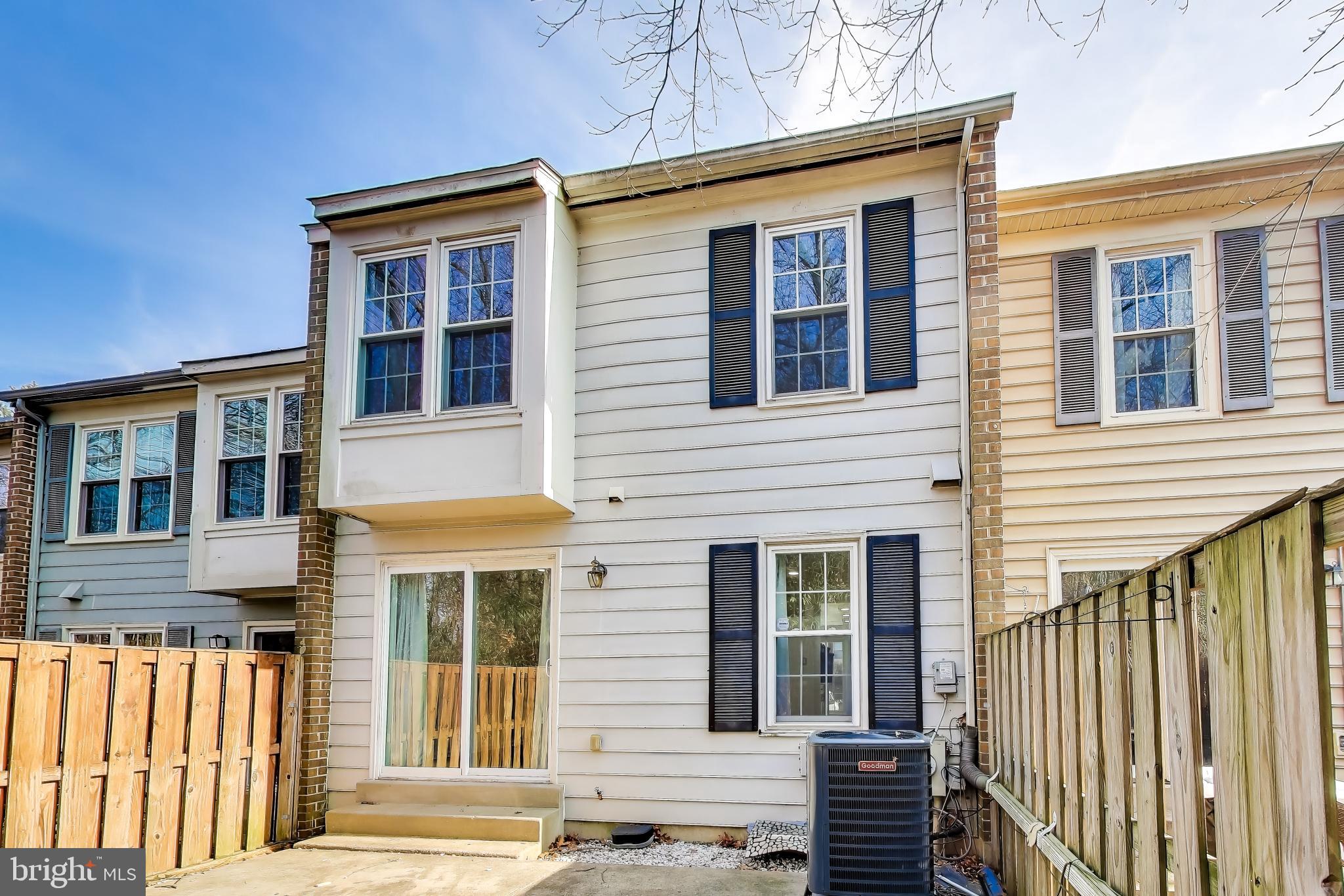 20210 Maple Leaf Court Gaithersburg, MD 20886 - Photo 28 of 31 a front view of a house with a porch