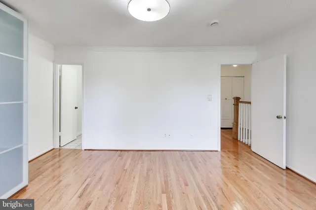 a view of room with hardwood floor