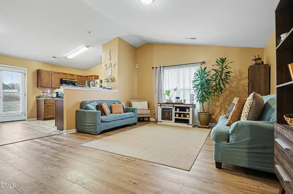 a living room with furniture and a couch