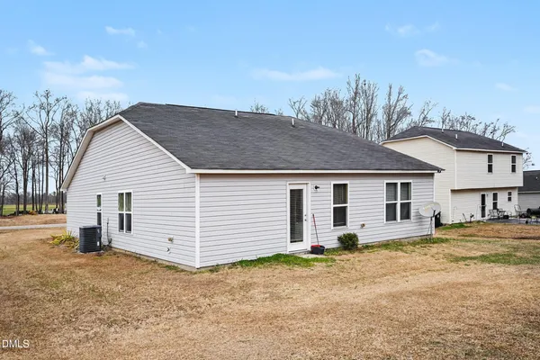 a house that has a window in front of it