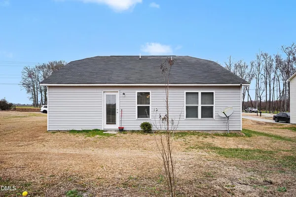 a house view with a garden space