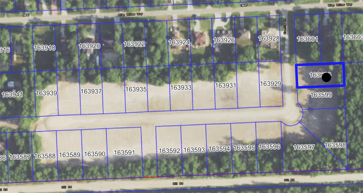 Lot 179 Evening Lane Porter, TX 77365 - Photo 2 of 6 a couple of cars parked in front of building