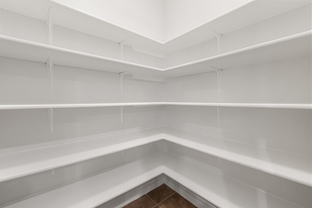 11129 Bastogne Loop Austin, TX 78739 - Photo 14 of 40 This pantry deserves its own moment. The amount of storage here is an absolute dream for busy households, Costco runs, holiday hosting, and keeping everyday life organized without clutter taking over the kitchen.