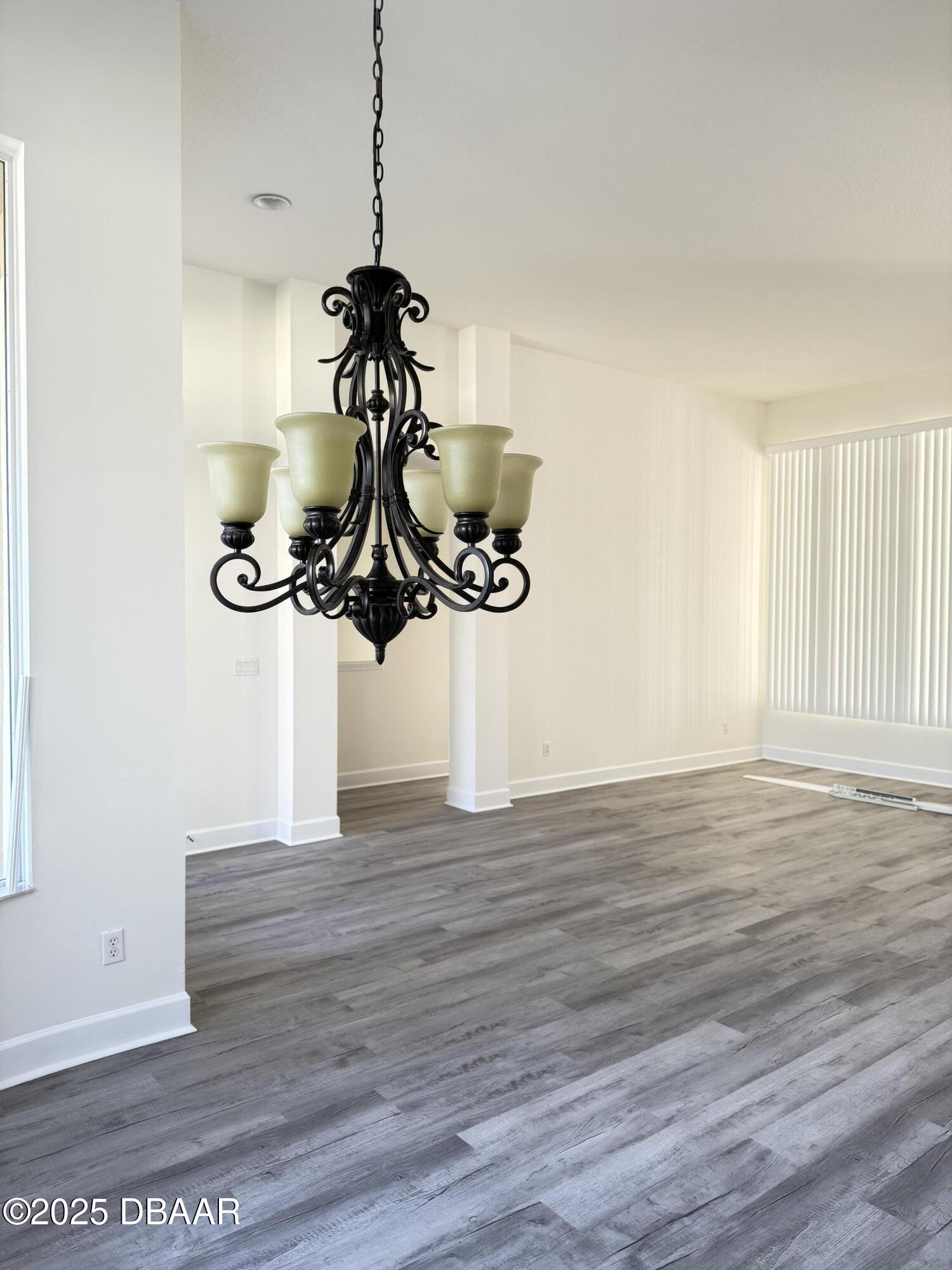 14 Deep Woods Way Ormond Beach, FL 32174 - Photo 14 of 38 a view of a room with wooden floor