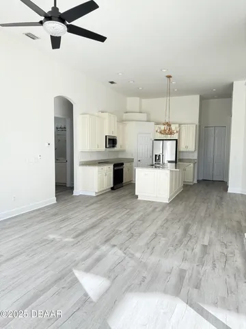 a view of a car parked in front of a house