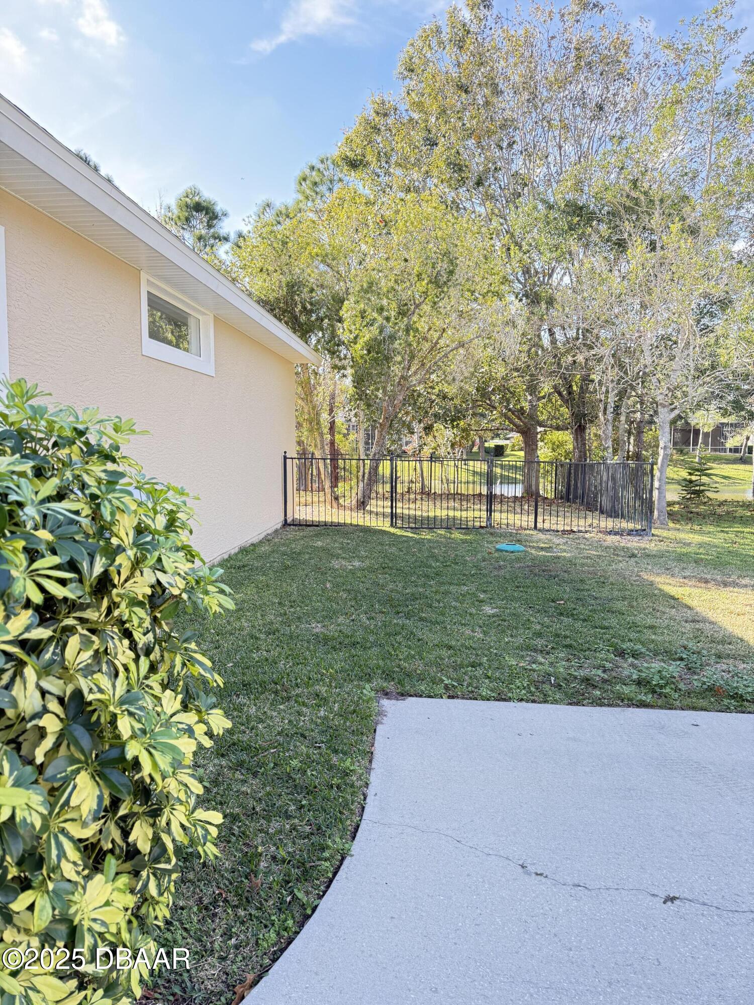 14 Deep Woods Way Ormond Beach, FL 32174 - Photo 38 of 38 front view of a house with a yard