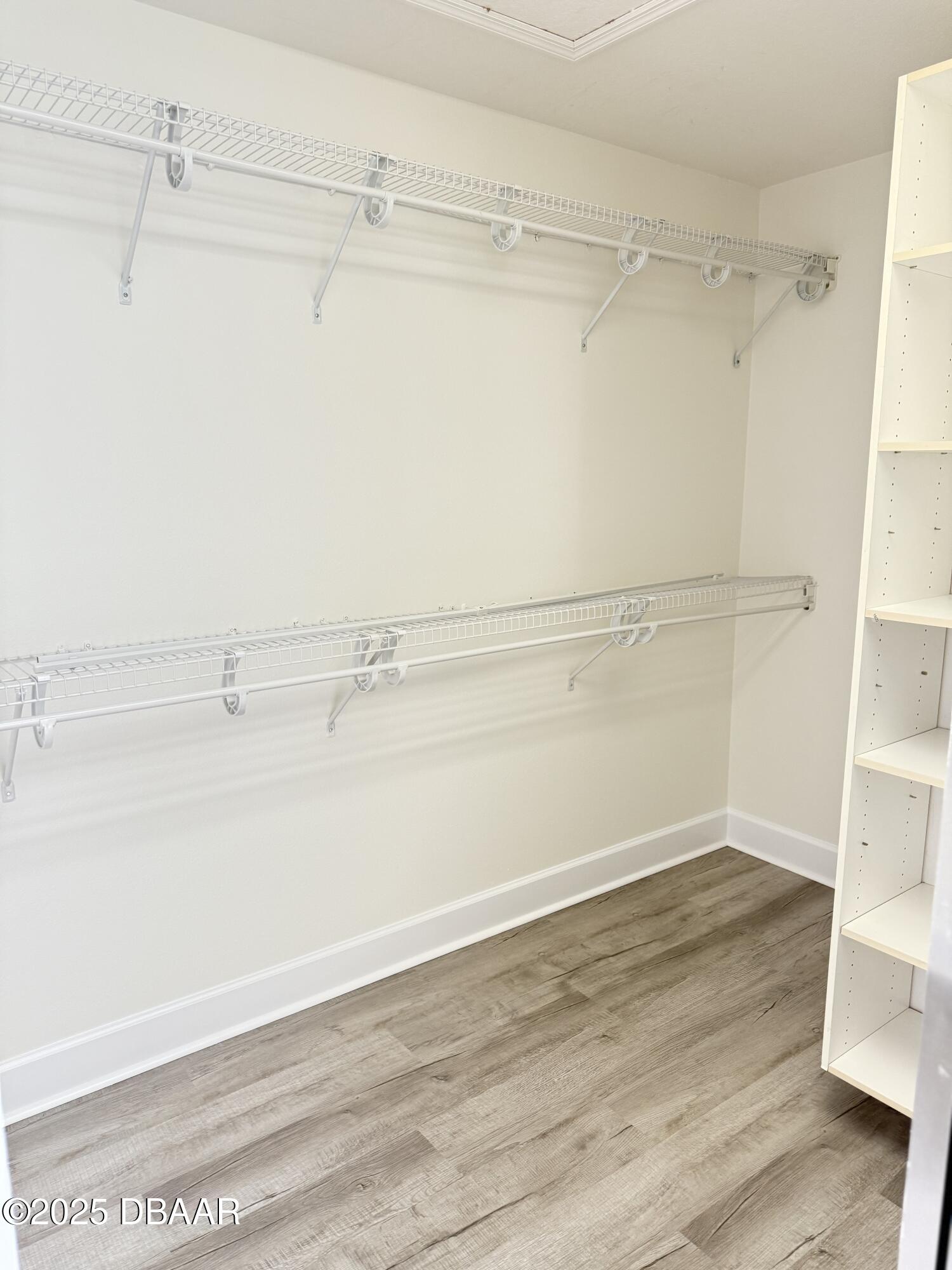 14 Deep Woods Way Ormond Beach, FL 32174 - Photo 4 of 38 a view of a room with racks on the wall