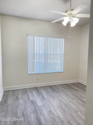 a view of a bathroom from a hallway