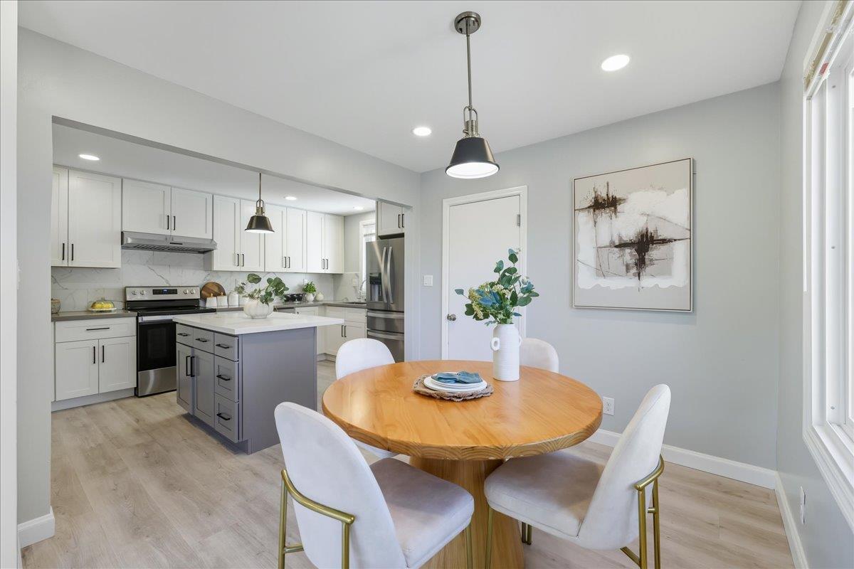 18 Culver Court San Mateo, CA 94403 - Photo 14 of 71 a view of a dining room with furniture and wooden floor