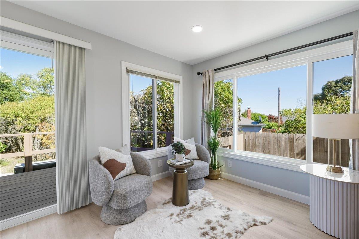 18 Culver Court San Mateo, CA 94403 - Photo 3 of 71 a living room with furniture and a floor to ceiling window