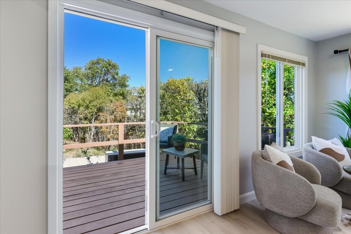 18 Culver Court San Mateo, CA 94403 - Photo 38 of 71 a balcony with furniture and a potted plant