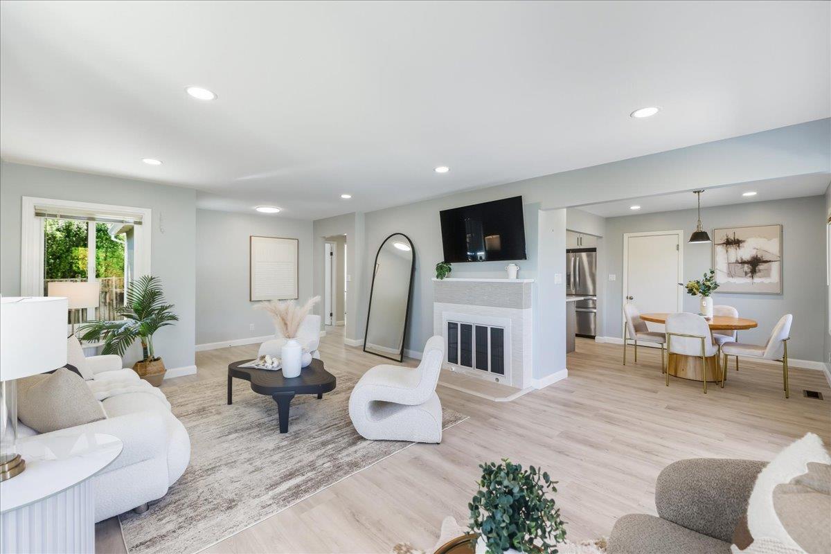 18 Culver Court San Mateo, CA 94403 - Photo 6 of 71 a living room with furniture and a fireplace