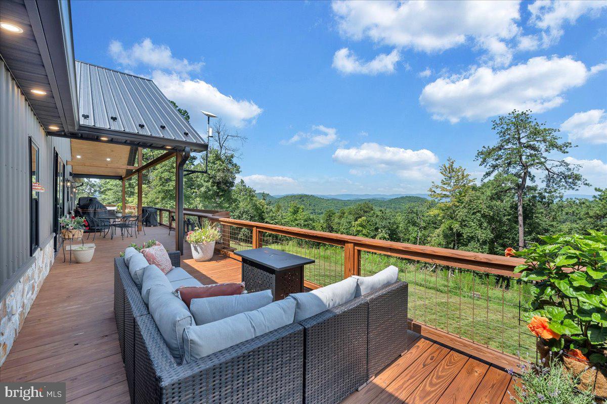 415 Grahams Farm Road Stuart, VA 24171 - Photo 11 of 121 Scenic deck with mountain views.