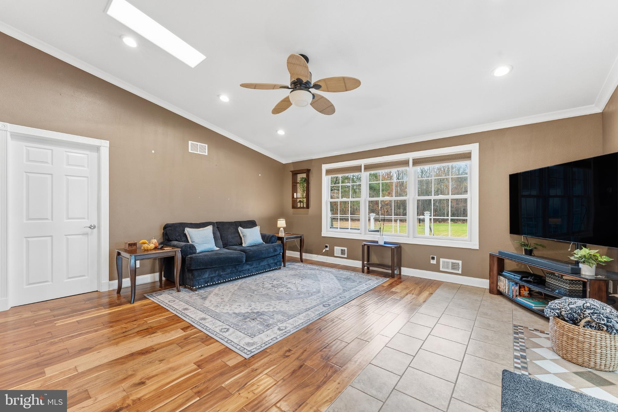 332 Gordon Road Robbinsville, NJ 08691 - Photo 13 of 47 a living room with furniture and a flat screen tv