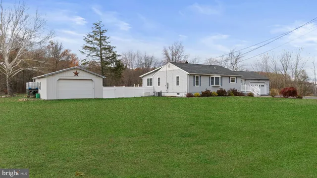 a front view of house with garden
