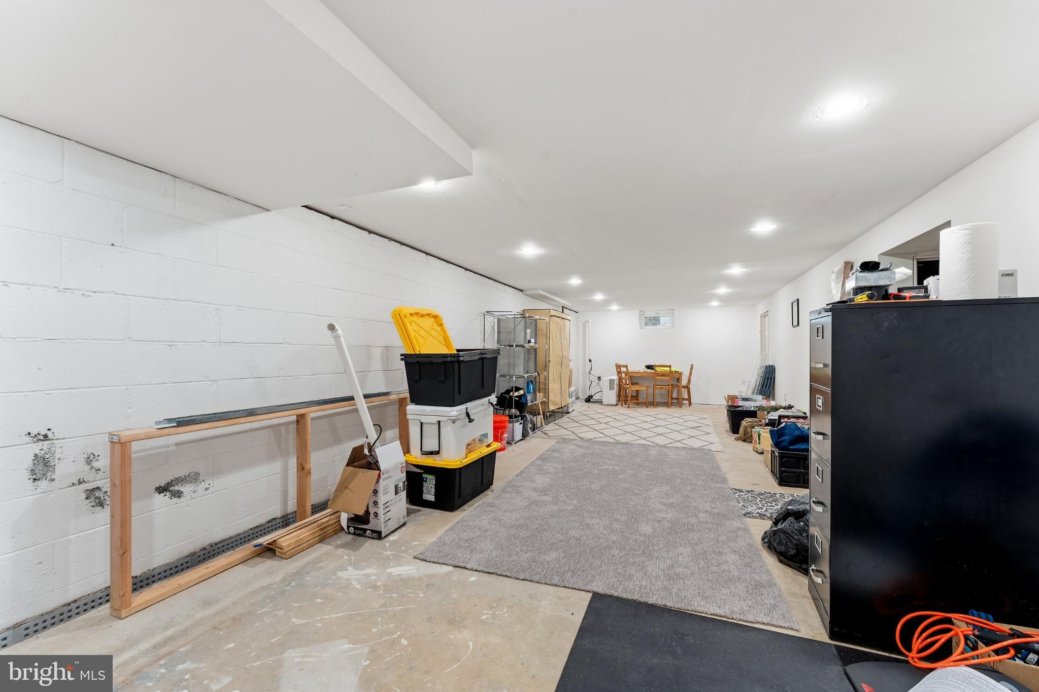 332 Gordon Road Robbinsville, NJ 08691 - Photo 28 of 47 a living room with furniture and a flat screen tv