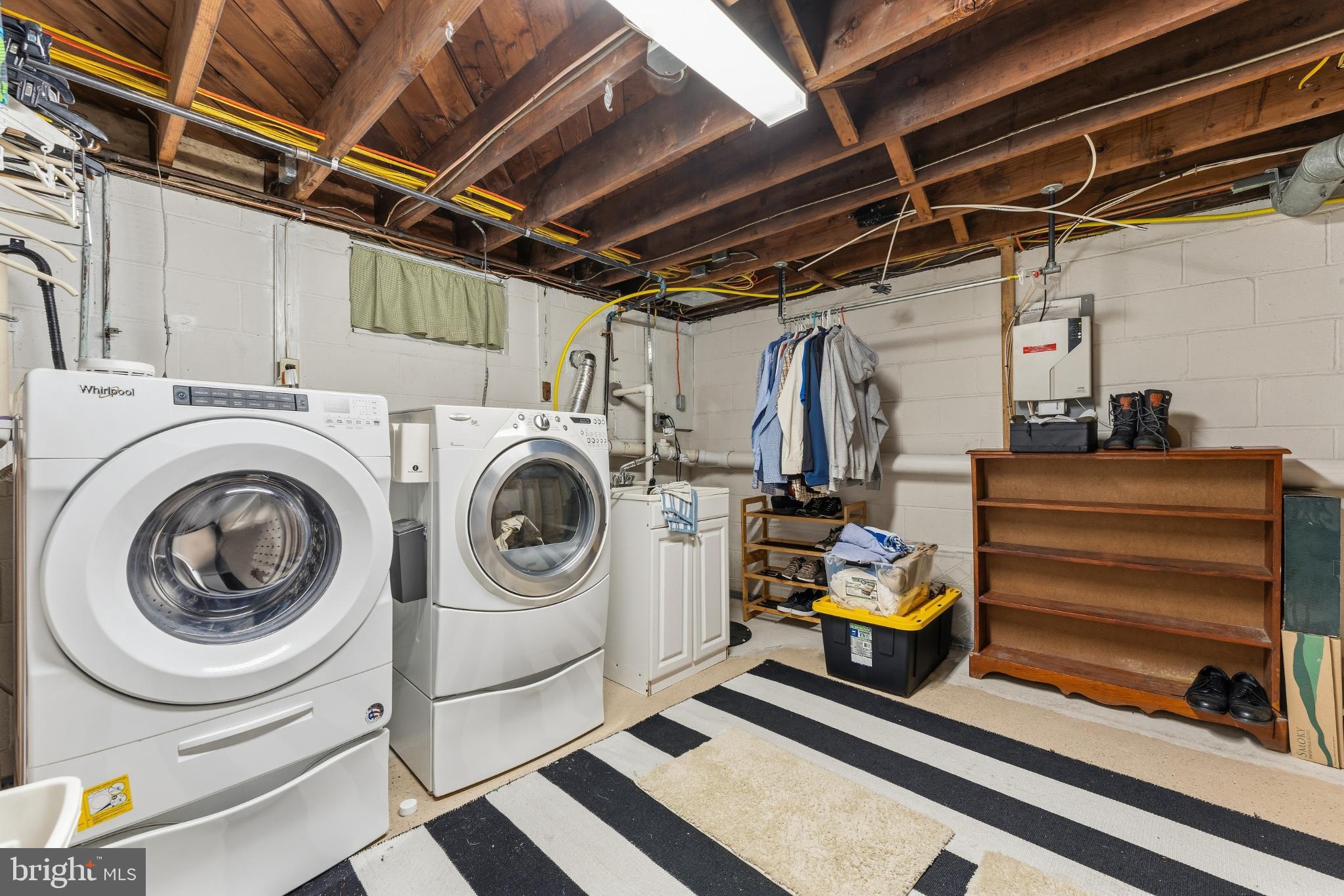 332 Gordon Road Robbinsville, NJ 08691 - Photo 30 of 47 a utility room with dryer washer and a view of living room