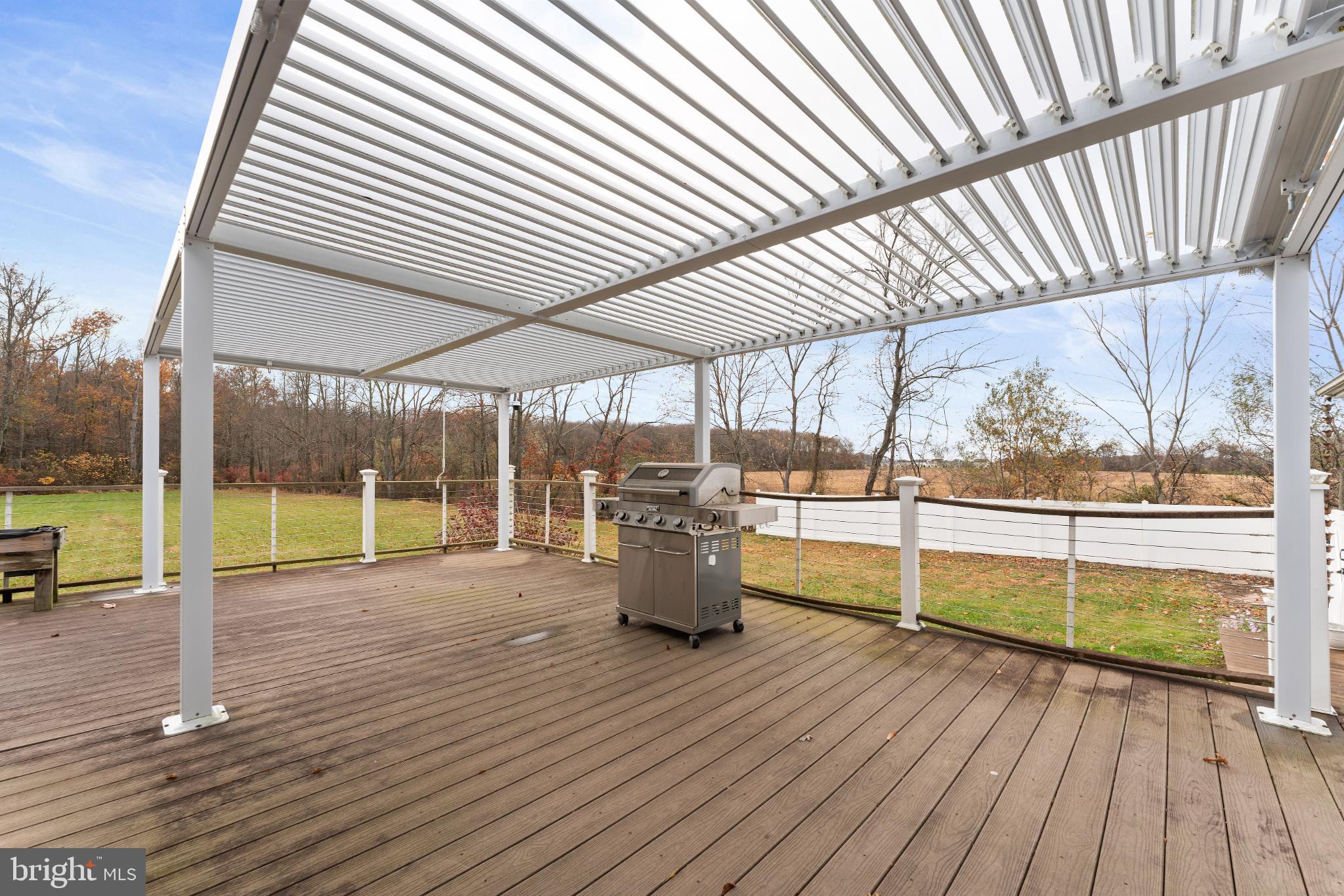 332 Gordon Road Robbinsville, NJ 08691 - Photo 31 of 47 a view of a room with wooden floor and iron stairs