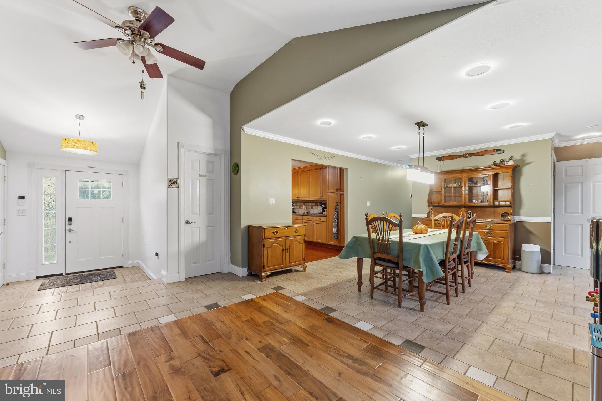 332 Gordon Road Robbinsville, NJ 08691 - Photo 6 of 47 a living room with furniture a dining table and chairs with wooden floor