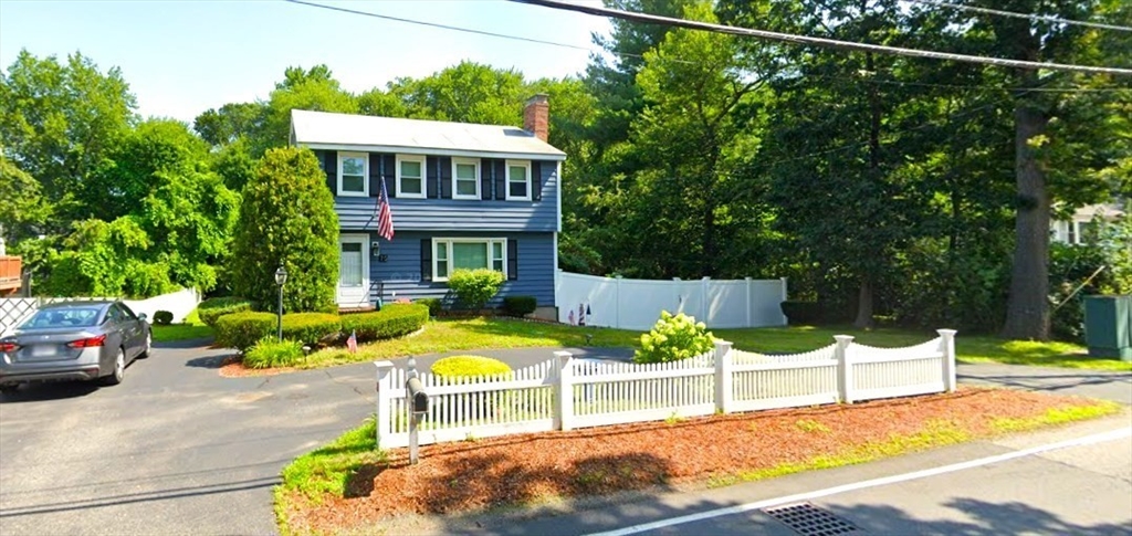 75 Brown Street Tewksbury, MA 01876 - Photo 28 of 28 a view of a house with backyard and sitting area