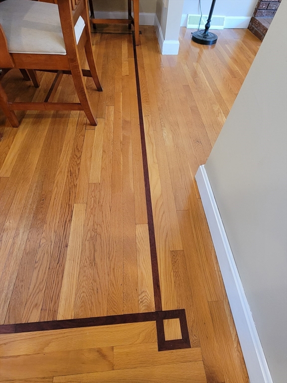 75 Brown Street Tewksbury, MA 01876 - Photo 7 of 28 a view of a room with wooden floor and stairs