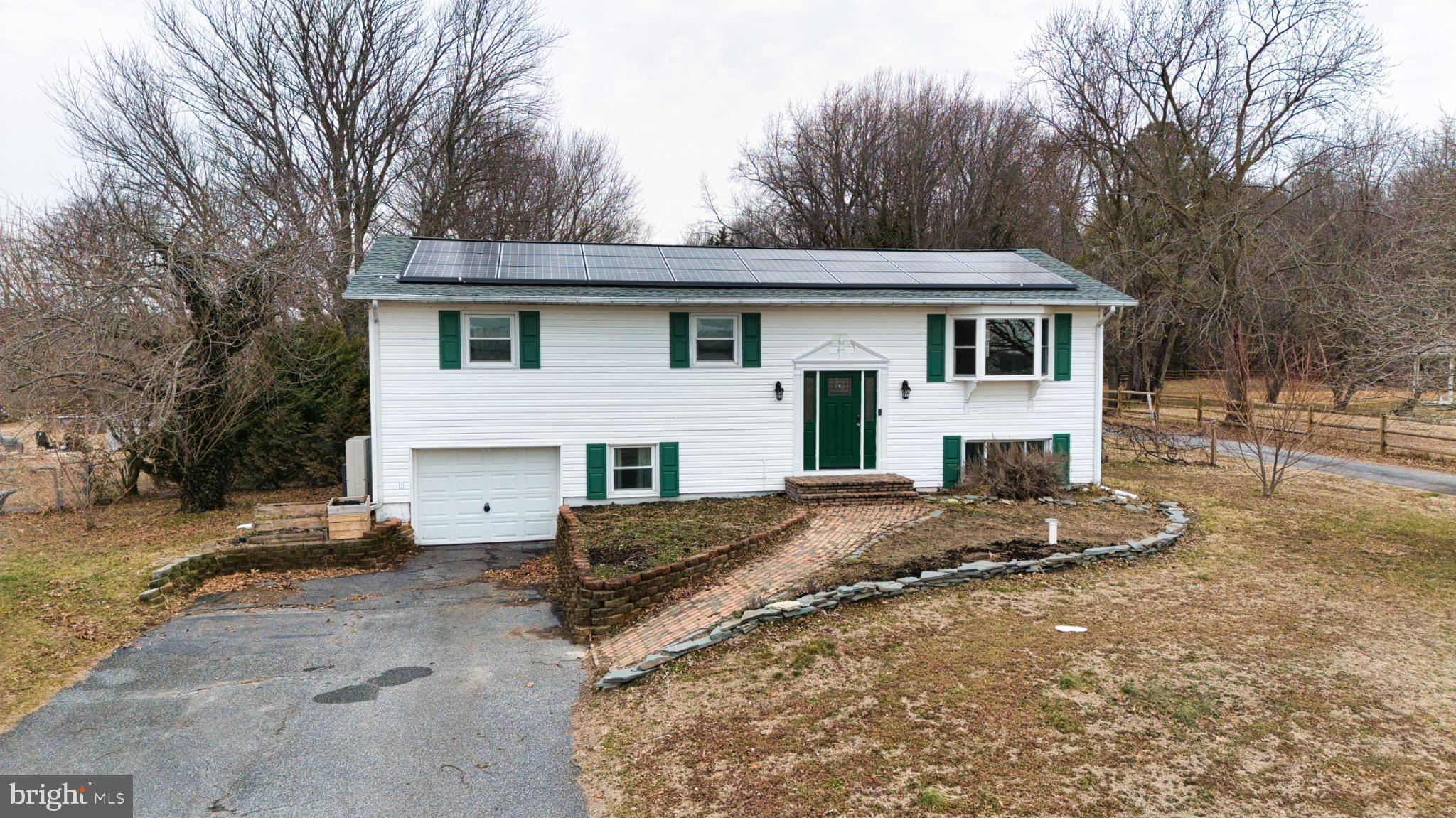 3231 Williamsville Road Houston, DE 19954 - Photo 1 of 64 Updated Split-level home with paid off solar!