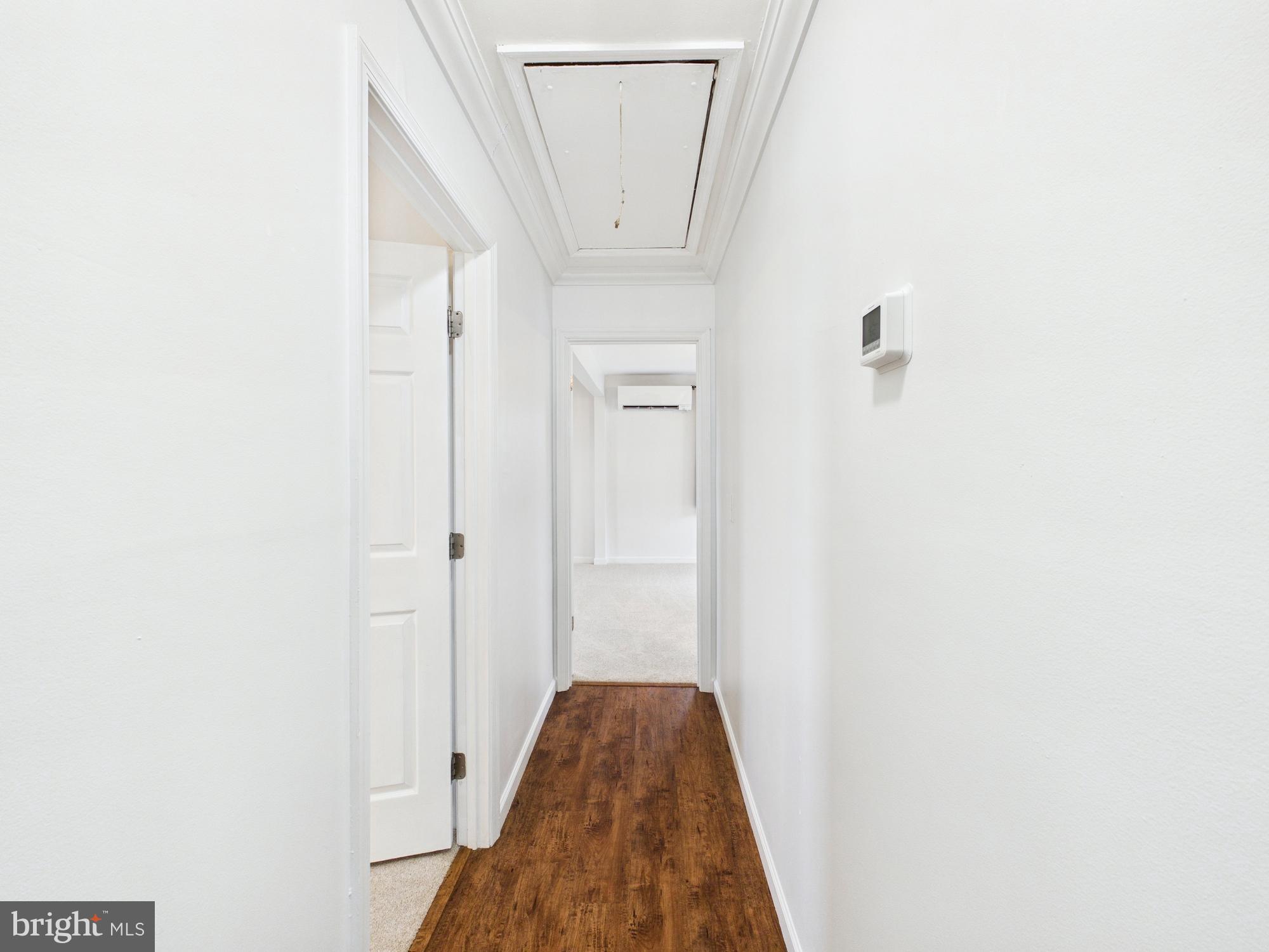 3231 Williamsville Road Houston, DE 19954 - Photo 19 of 64 Hallway to Primary & Bedroom 1