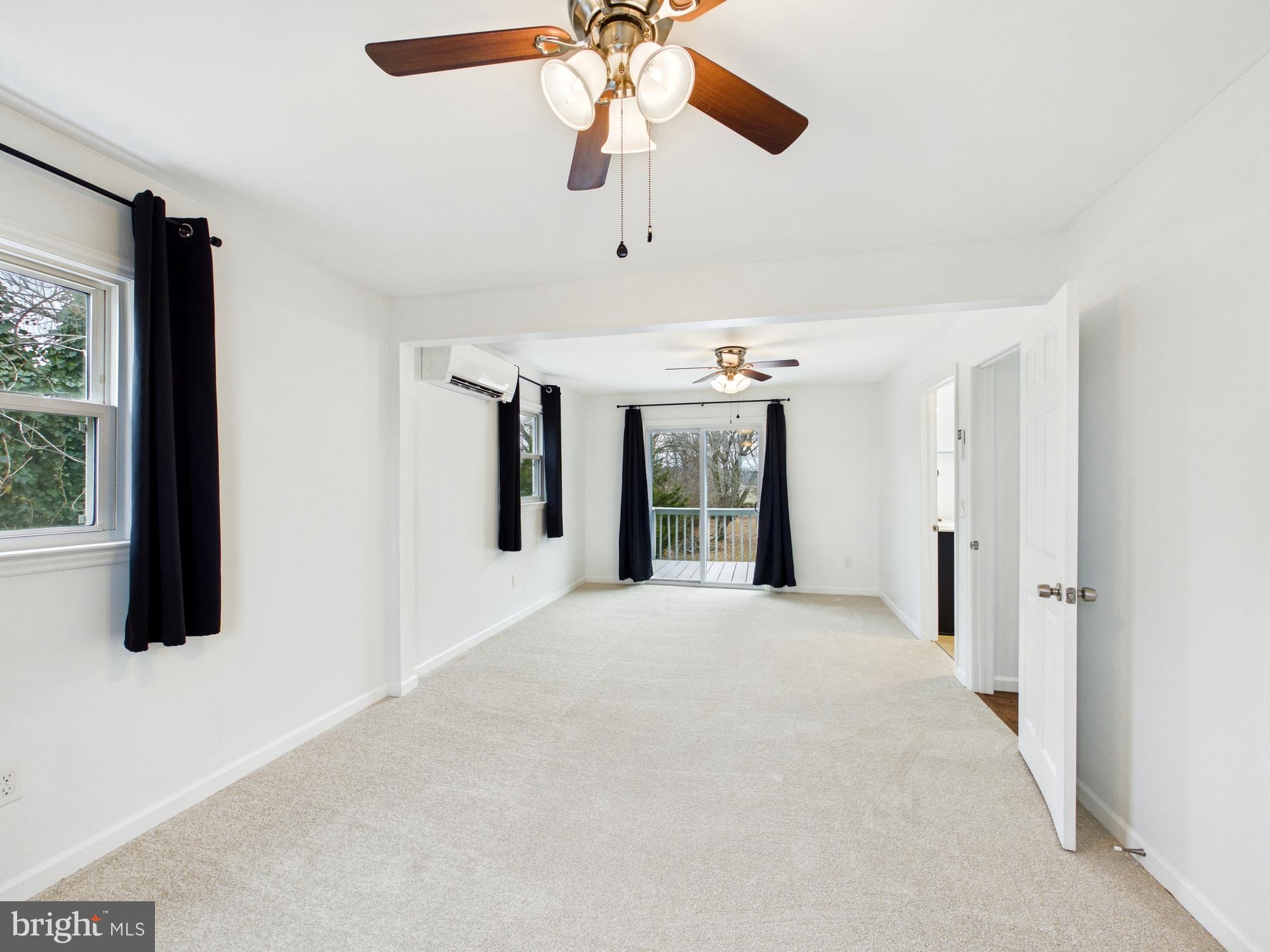 3231 Williamsville Road Houston, DE 19954 - Photo 21 of 64 Spacious, light-filled primary bedroom