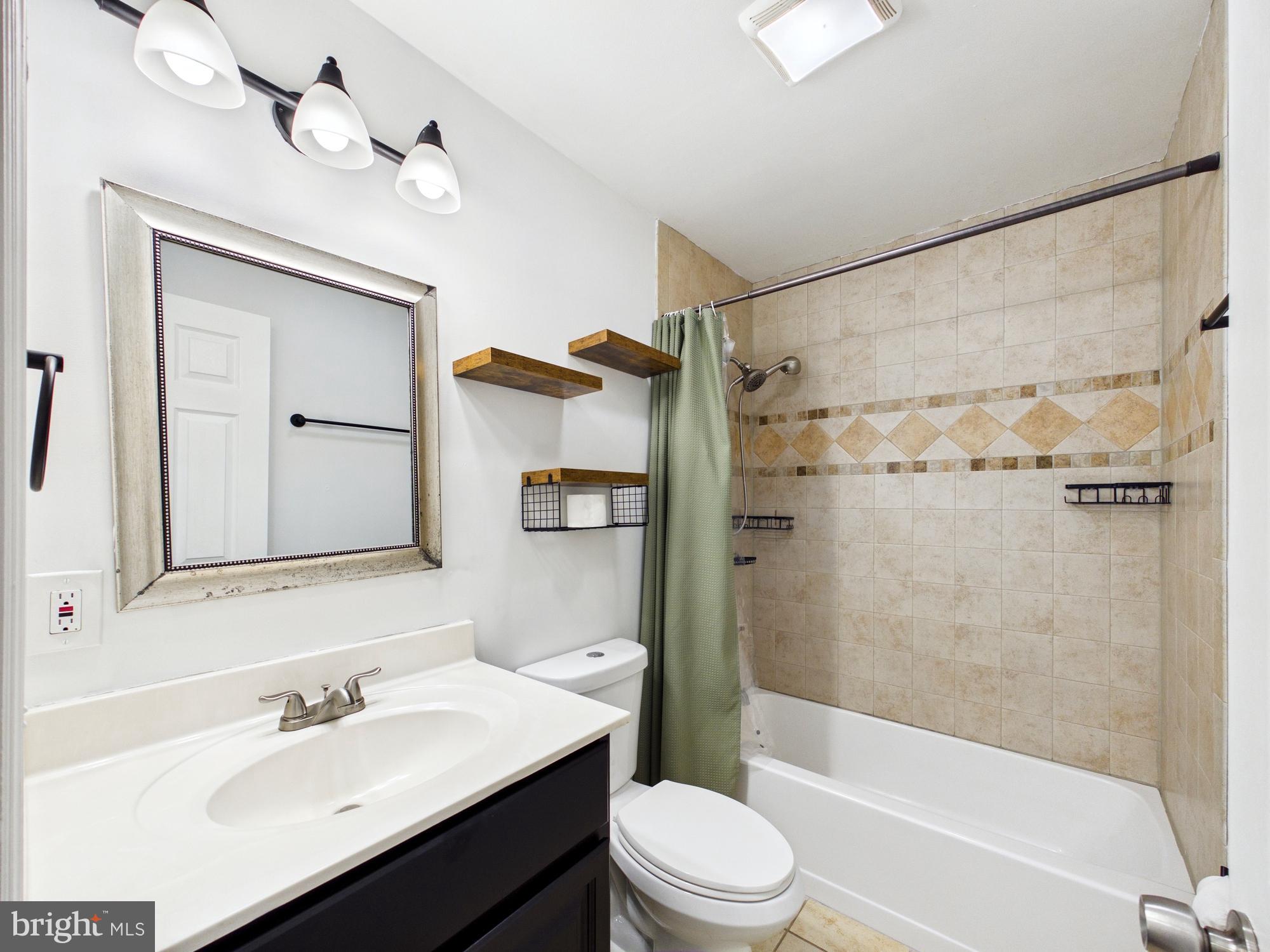 3231 Williamsville Road Houston, DE 19954 - Photo 28 of 64 Modern hall bathroom with stylish fixtures.