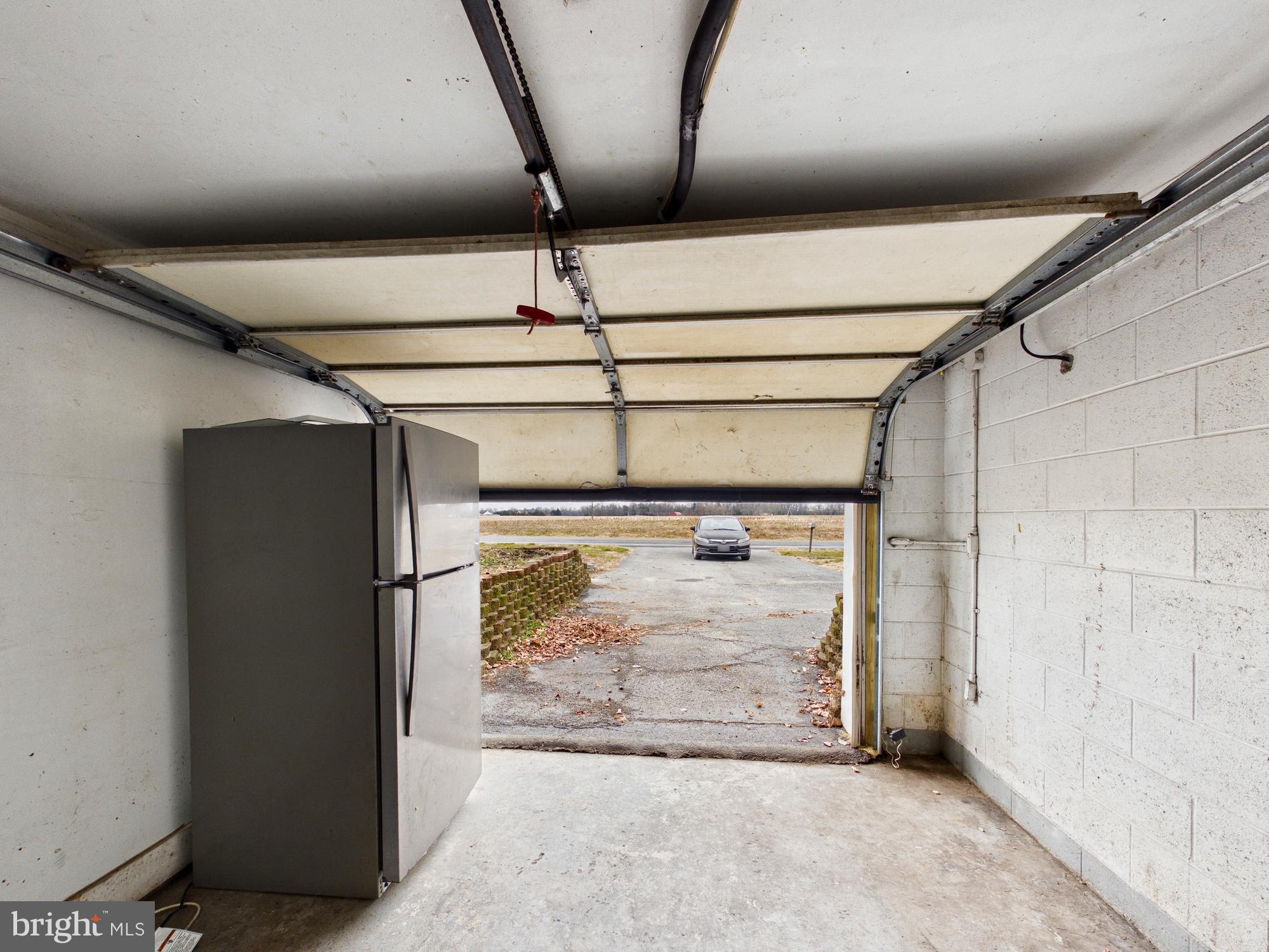 3231 Williamsville Road Houston, DE 19954 - Photo 40 of 64 Spacious garage with outdoor access.