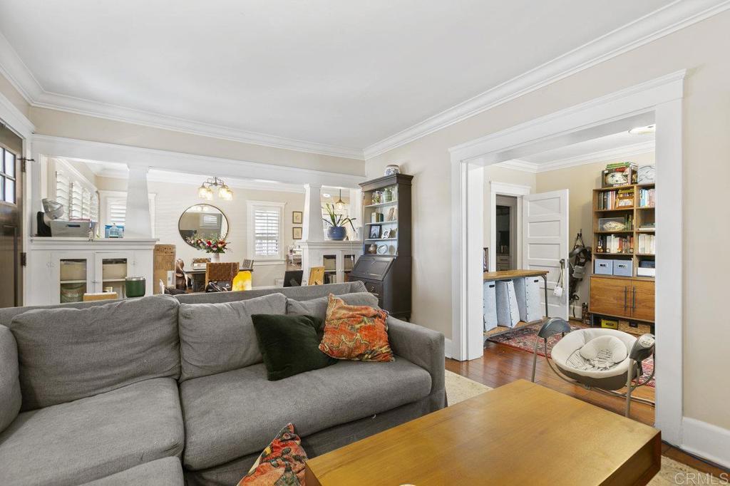 3373-3379 1/2 Herman Avenue San Diego, CA 92104 - Photo 11 of 70 a living room with furniture and a large window