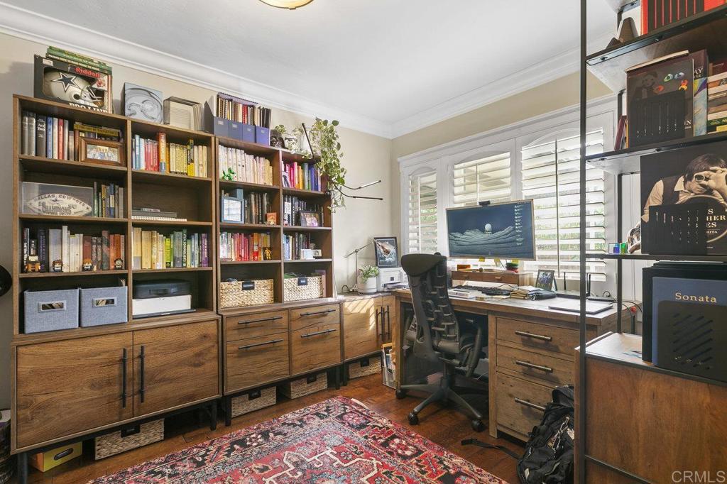 3373-3379 1/2 Herman Avenue San Diego, CA 92104 - Photo 12 of 70 a room with furniture window and book shelf