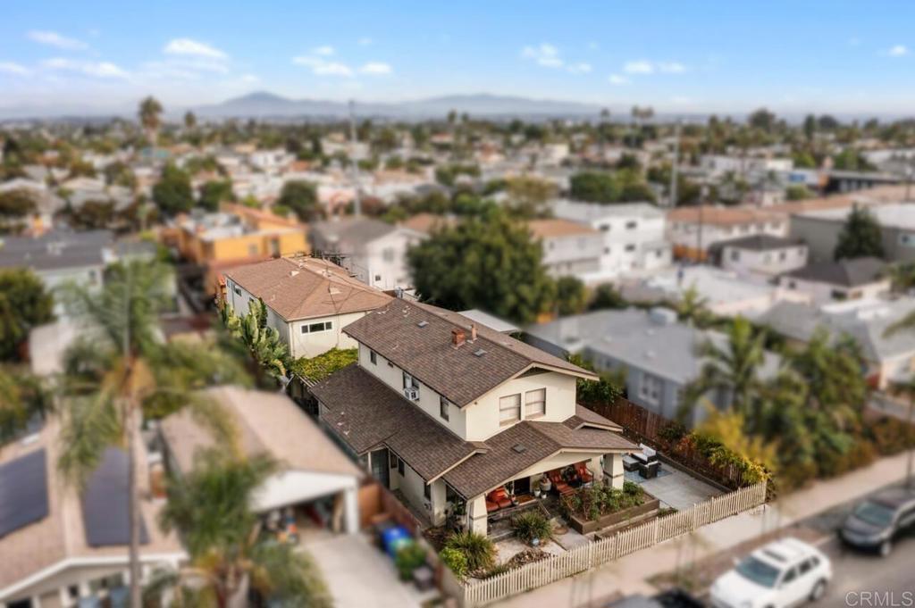 3373-3379 1/2 Herman Avenue San Diego, CA 92104 - Photo 2 of 70 an aerial view of a residential apartment building with a yard