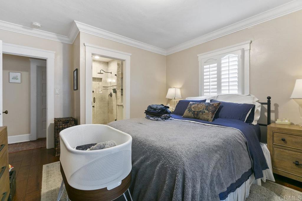 3373-3379 1/2 Herman Avenue San Diego, CA 92104 - Photo 21 of 70 a bed room with a bed and a window